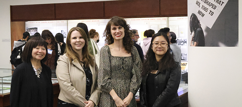 University Librarian Lorelei Tanji with Anteater Spirit curators Carolyn Downey, Jenna Dufour, and Faith Lam.