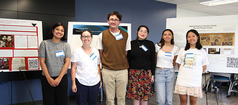 Fellows Ariana Vargas, Lily Victoria Amidon, Sebastián Calderón, Gisele Valdovinos, Adilene Garcia Hernandez, and Corinna Siu Mun Lee Chin with a few of their research posters.