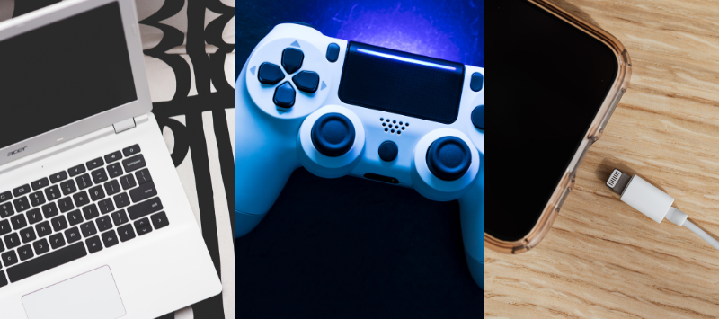 Laptop keyboard, video gaming controller, and iPhone with charging cable