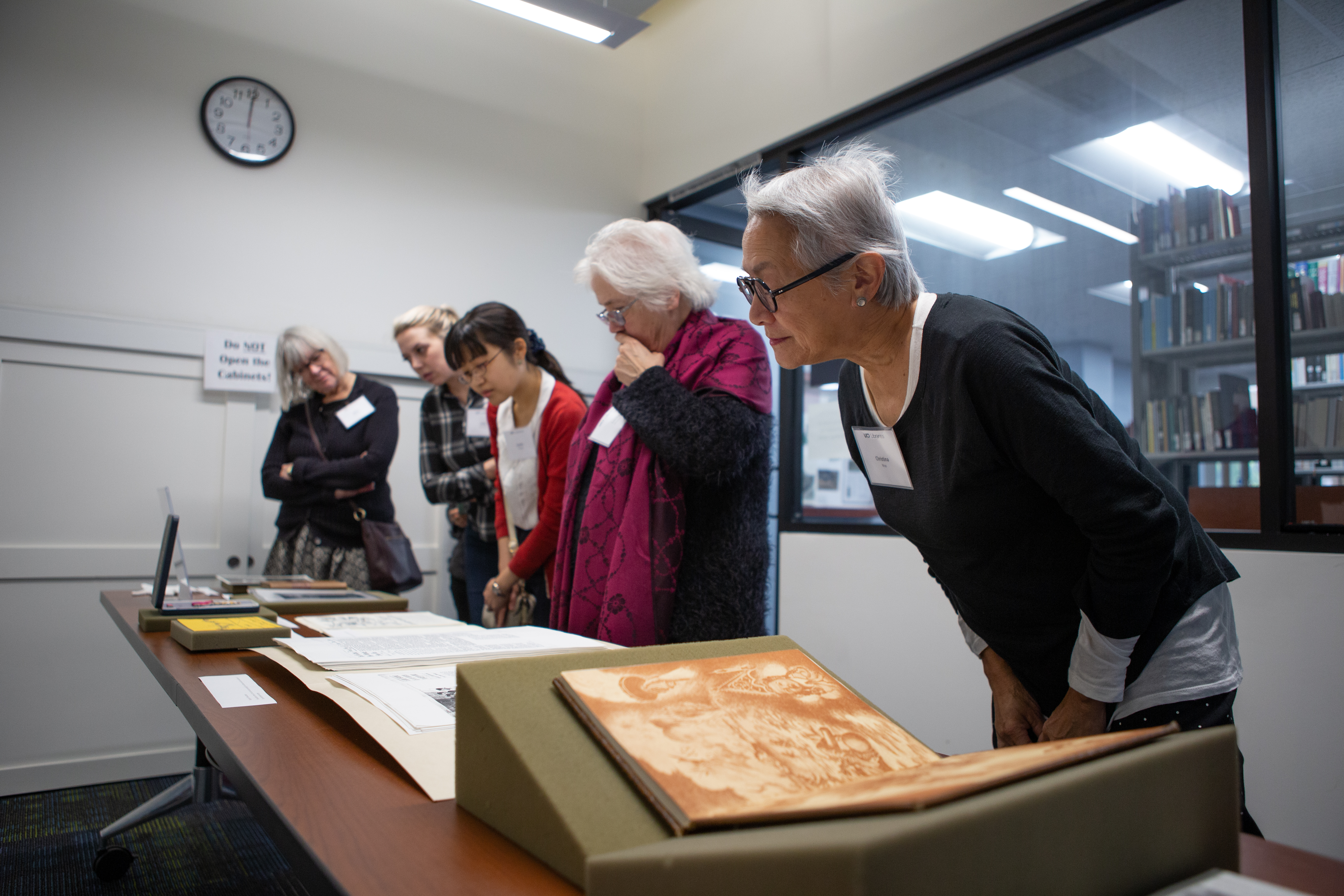 Patrons view materials in the Orange County and Southeast Asian Archive Center.