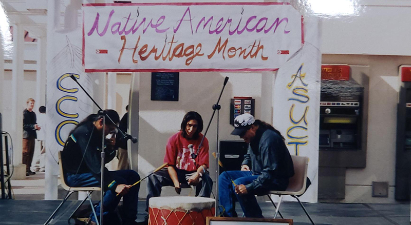 Students playing music at an ASUCI Native American Heritage Month celebration